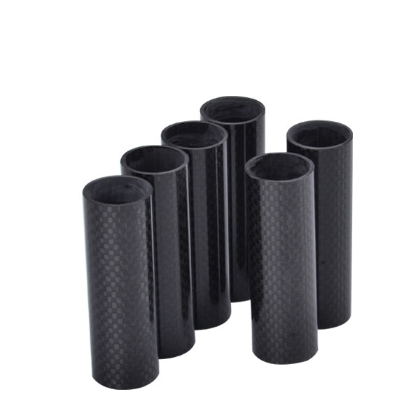 Roll wrapped carbon fiber tubes